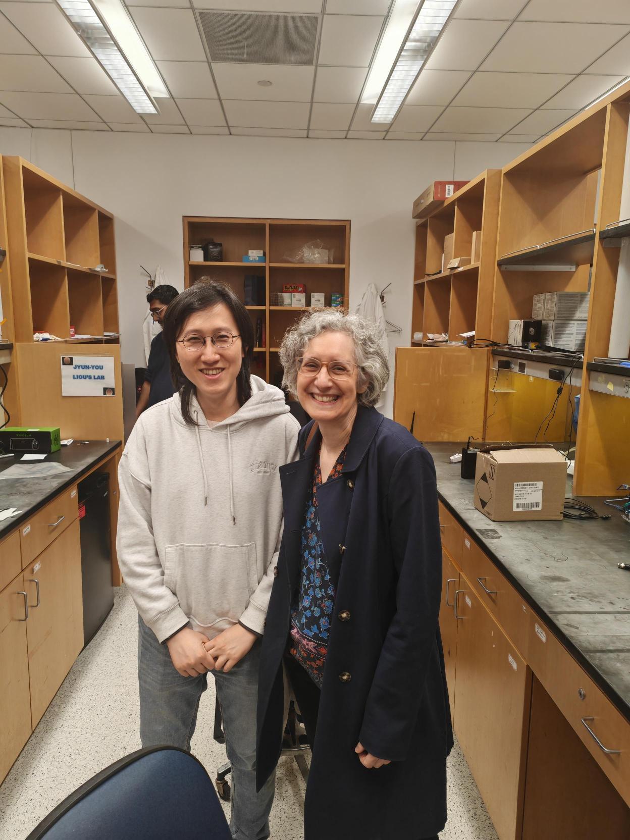 Dr. Catherine A. Schevon with Principal Investigator Jyun-you Liou during her visit to Liou Lab